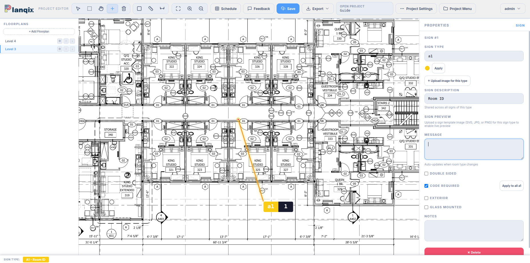 A sign placed on the floor plan with its tag positioned away from the location dot, connected by a leader line, and the Properties panel open